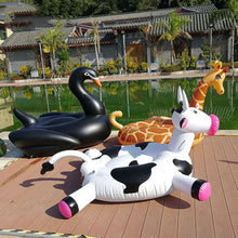 Load image into Gallery viewer, "Spotted Splendor: The Ultimate Pool Float Experience with Our Awesome Spotted Cow Float"