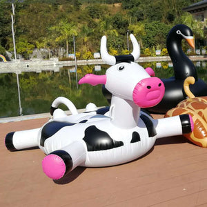 "Spotted Splendor: The Ultimate Pool Float Experience with Our Awesome Spotted Cow Float"