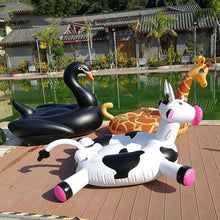 Load image into Gallery viewer, &quot;Spotted Splendor: The Ultimate Pool Float Experience with Our Awesome Spotted Cow Float&quot;
